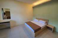 ห้องนอน SPOT ON 90025 Sr Valley Hotel
