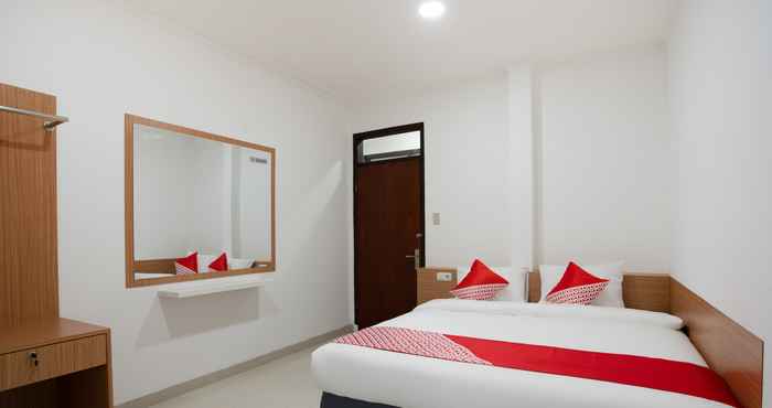 ห้องนอน Super OYO 3209 Hegarbudhi Residence