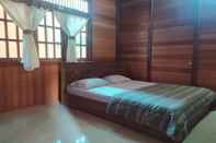 Bedroom OYO 3383 Roemah Kayu Saragan Syariah