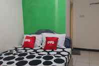Bedroom OYO 3449 Putri Garuda Syariah Near RSU Adi Husada Undaan Kota Surabaya