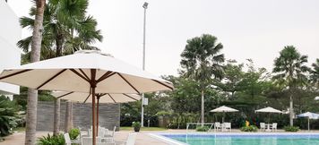 Swimming Pool 2 Modern and Comfy 2BR at Aeropolis Residence By Travelio