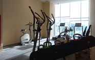 Fitness Center 6 Warm 3BR Apartment at Ambassade Residences By Travelio