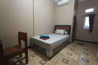 Bedroom SPOT ON 3525 Penginapan Magnolia Syariah