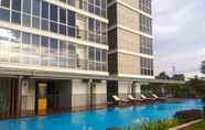 Swimming Pool 7 Best 1BR Apartment at Lexington Residence By Travelio