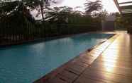 Swimming Pool 6 Best 1BR Apartment at Lexington Residence By Travelio