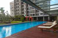Swimming Pool Best 1BR Apartment at Lexington Residence By Travelio