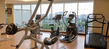 Fitness Center 4 Homey and Tranquil Studio Menteng Park Apartment By Travelio