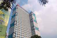 Bangunan Cozy Studio Grand Dhika City Apartment By Travelio