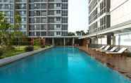 Swimming Pool 5 1BR Monochrome at Lexington Apartment By Travelio