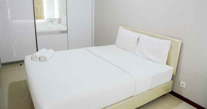 Bedroom Simply Spacious 1BR at Green Bay Condominium Apartment By Travelio