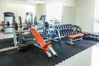 Fitness Center Homey 1BR Puri Orchard Apartment By Travelio