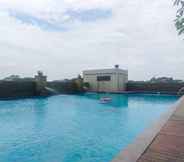 Swimming Pool 7 Minimalist 2BR Gading Greenhill Apartment By Travelio