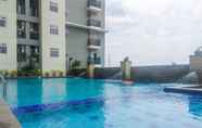 Swimming Pool 6 Minimalist 2BR Gading Greenhill Apartment By Travelio