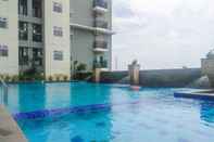 Kolam Renang Minimalist 2BR Gading Greenhill Apartment By Travelio