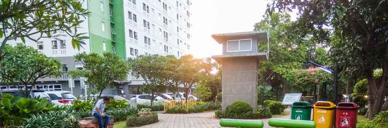 Lobby Comfy 1BR Green Pramuka Apartment By Travelio