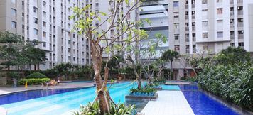 Swimming Pool 5 Best View Studio Apartment at Green Bay Pluit By Travelio