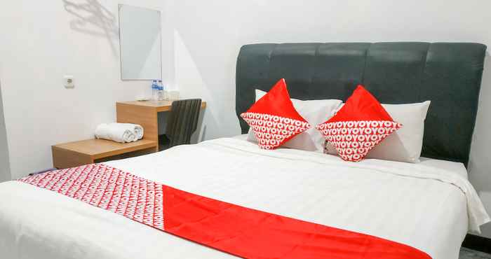 Kamar Tidur OYO 3729 Cattail Guest House