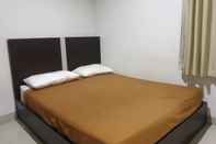 Kamar Tidur OYO 3739 Vanone Home