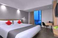 ห้องนอน Neo Hotel Puri Indah by ASTON