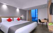 Bedroom 5 Neo Hotel Puri Indah by ASTON