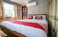 ห้องนอน 2 OYO 402 Raknatee Resort
