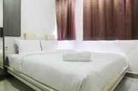 Bedroom Homey 1BR The Oasis Cikarang By Travelio