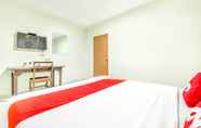 Bedroom 4 OYO 722 I Oun Inn