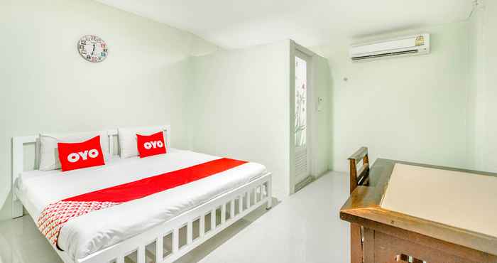 Bedroom OYO 722 I Oun Inn