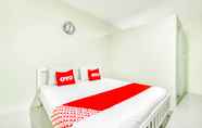 Bedroom 3 OYO 722 I Oun Inn