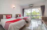 Kamar Tidur 4 Malee Bunga Hotel