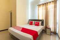 Kamar Tidur OYO 3763 Oq Guest House Syariah