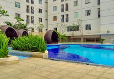 Swimming Pool 6 2BR City View Apartment Bassura City near Shopping Mall By Travelio