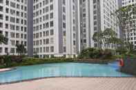 Swimming Pool Studio Comfy Apartment with Extra Bed at M-Town Residence By Travelio