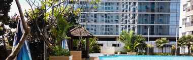 Swimming Pool 2 2BR Comfortable at Signature Park Tebet Apartment By Travelio