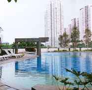 Swimming Pool 4 2BR Modern at The Wave Epicentrum Apartment near Kuningan By Travelio