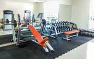 Fitness Center 4 Studio Pool View Apartment at Puri Orchard By Travelio