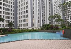 Kolam Renang 2 2BR Relaxing Apartment at M-Town Residence By Travelio