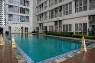 Swimming Pool Studio Cozy Minimalist @ Taman Melati Margonda Apartment By Travelio