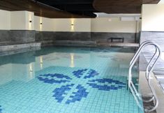 Swimming Pool 3 Studio Prime & Comfy @ Tamansari La Grande Apartment By Travelio