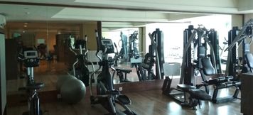 Pusat Kecergasan 4 Studio Modern Room at Tamansari La Grande Apartment By Travelio