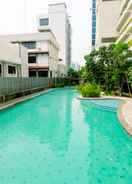 SWIMMING_POOL 2BR Apartment at Capitol Park Residence By Travelio