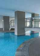 SWIMMING_POOL Studio Apartment at Green Park View By Travelio