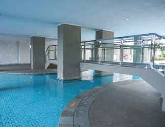 Swimming Pool 2 Studio Apartment at Green Park View By Travelio