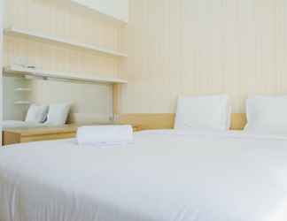 Bedroom 2 Simple Studio at Educity Apartment Pakuwon City By Travelio