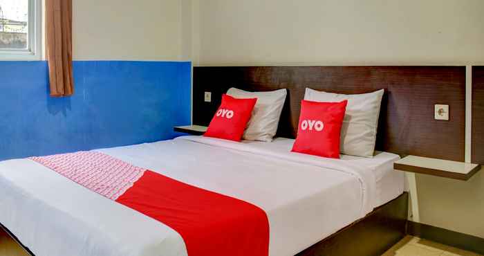 ห้องนอน OYO 90162 Remboelan Guest House