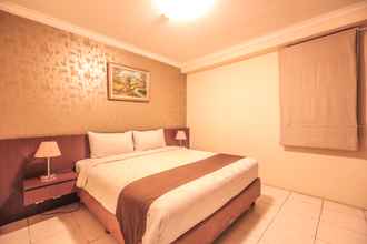 Kamar Tidur 4 Opulence Folksy Hotel