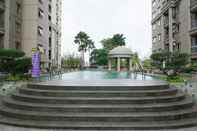 Swimming Pool Nice and Simple Style 2 BR Grand Palace Kemayoran Apartment By Travelio