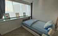 Bedroom 4 Apartemen Grand Kamala Lagoon Cozy By Evan