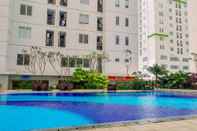 สระว่ายน้ำ Good 2BR Bassura City Apartment with City View By Travelio