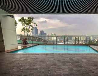 Swimming Pool 2 Luxurious and Clean Studio Room At Menteng Park Apartment by Travelio